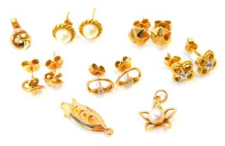 A group of 9ct gold and other earrings and clasps, studs, cultured pearl sets and others, 10.9g all