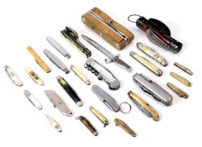 A group of penknives, comprising silver and mother of pearl handled, stainless steel and mother of p