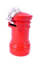 A Beswick Cat's Collection money box, depicting a white cat atop a red letter box, 15cm high.