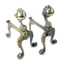 A pair of late 19thC fire dogs, formed with ball and claw top, on claw tripod feet, 25cm high, 15cm