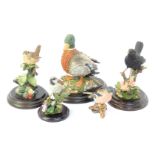 Four Country Artist bird figures, comprising Broadway Blackbird CA569, Sparrow with ivy leaved toadf