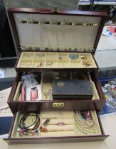 A jewellery box and contents of costume jewellery, a Constance quartz wristwatch, stone set dress ri