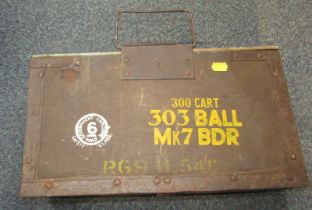A military ammunition case marked 303 Ball MK7BD, containing light bulbs.