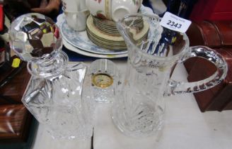 Glassware, comprising Polish lead crystal milk jug, decanter and stopper and a Waterford crystal man