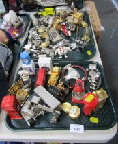 Various miniature table clocks, Park Lane steering wheels, motorbikes, etc. (2 trays)