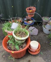 Various garden planters, to include terracotta, moulded plastic, plant pot holder with three compart