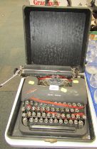 A Smith Corona Clipper typewriter.