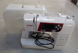 A cased Jenome sewing machine, with quilting accessory equipment, JQ2, boxed, and a model 21390 cont