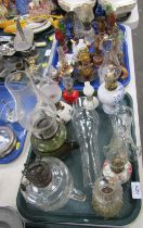 A collection of miniature oil lamps. (2 trays)