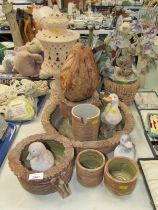 A studio pottery water fountain, formed as two amusing masks, with large centre bowl, various other