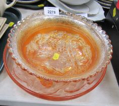 A carnival glass bowl and a pink 1920s style centrepiece bowl decorated in the Under the Sea pattern