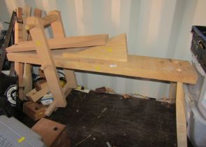 A wooden work bench, 74cm high, together with a veneer inlay cutter, etc.