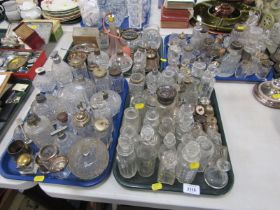 A quantity of silver plated and cut glass cruet bottles and parts, scent bottles, etc. (4 trays)