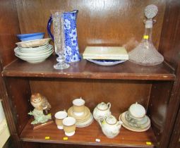 A glass ships decanter, Chinese style bowls, blue and white jug, eggshell porcelain part tea service