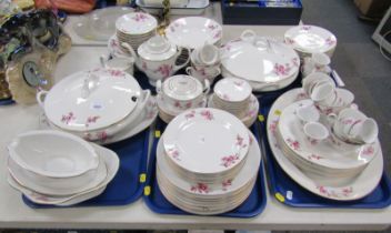 A Chinese decorative part tea and dinner service, in the Pink Cherry Blossom pattern. (5 trays)