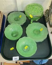 Green finish glass ware, comprising four dessert bowls and six side plates, together with a rose bow