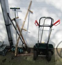 A group of garden tools, to include scythe, post digger, etc. (a quantity)