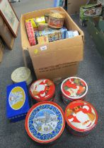 A group of collectors tins, to include Santa Claus, carousel and others. (1 box)