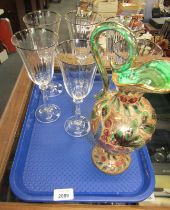 A set of six wine glasses, with a silvered rim and a decorative H Bequet Belgian jug. (1 tray)