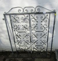 A grey painted wrought iron garden gate, 104cm high, 85cm wide.