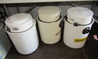 Three dust extractors. WARNING! This lot contains untested or unsafe electrical items.