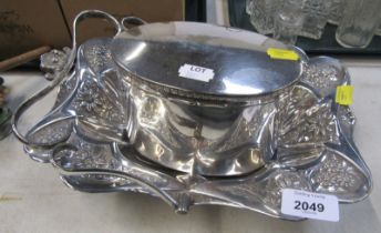 A silver plated serving basket, and a lidded oval tea caddy. (2)