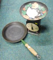 A Le Creuset green frying pan, a Hugh's Family Scales bargeware style painted set. (2)