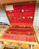 A cased Thailand canteen of brass cutlery, in presentation case.