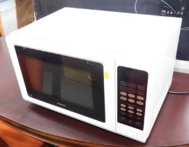 A Kenwood 900 watt microwave.