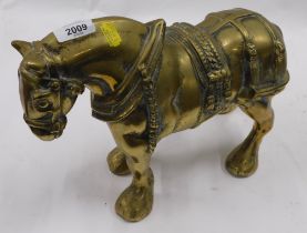 A brass shire horse, weighted.