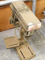 A Ryobi five speed drill press.