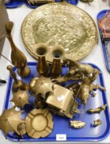 A quantity of brassware, comprising two hammered brass chargers, vases, shire horses, etc.