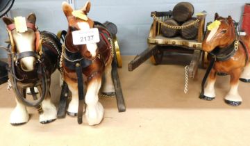 Two shire horse and carts, and an additional shire horse.