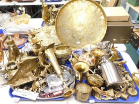 Various brassware, comprising a hammered Eastern charger, bells, animal ornaments, garden sprayer, p