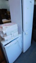 A Hotpoint fridge and a Beko fridge freezer. (2)