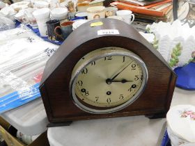 A Garrard Clock Company Limited oak cased mantel clock. (AF)