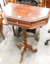 A reproduction demi lune table, with canted corners, boxwood floral inlay with single drawer on trip