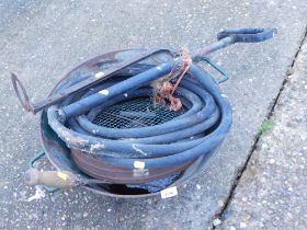 A green painted galvanized bucket, various tubing, two iron lasts, door stop, hatchet, etc. (a quant