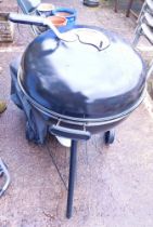 A Good Home drum coal barbecue, and cover.