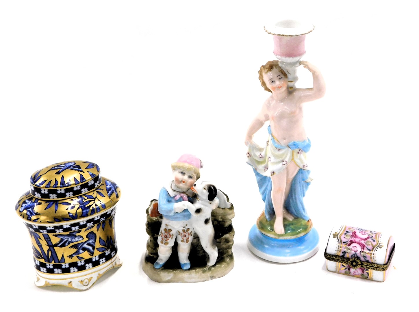 A group of 19thC and later porcelain, comprising a Dresden ceramic candle stand, depicting a child i