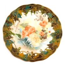 A Wedgwood Traditions Heirloom porcelain plate, later decorated with flowers and leaves within gilt