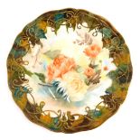 A Wedgwood Traditions Heirloom porcelain plate, later decorated with flowers and leaves within gilt