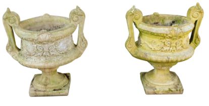 A pair of 19thC reconstituted stone campana urn planters, each with further moulded handles and shel