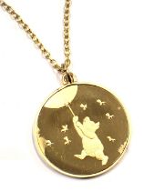 A Winnie the Pooh A. A. Milne pendant and chain, by John Pinches of London, the circular pendant dep