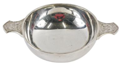 A Queen Elizabeth II silver quaich, the bowl with two serpent moulded border and handles, of plain d