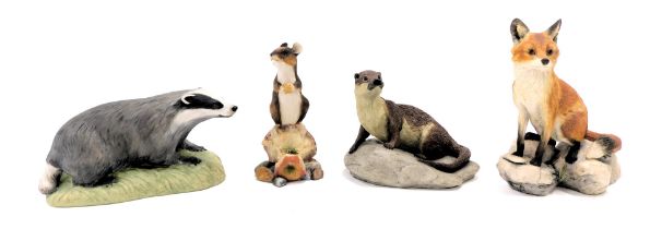 Animal figure groups, comprising an Arista designs otter, 10cm high, a Border Fine Arts fox on rock,