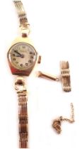 A 9ct gold Visible ladies wristwatch, the circular watch head on single strand bracelet, 1.5cm wide,