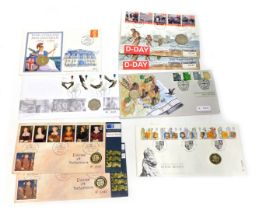 A group of first day covers and coin packs, comprising The Philatelic Numismatic Royal Beast one pou