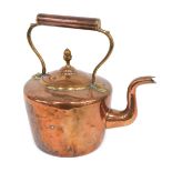 A Victorian copper and brass kettle, 28cm high.