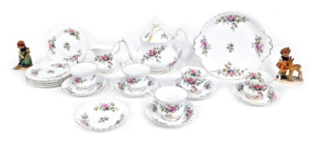 A Royal Albert Moss Rose pattern part tea service, two Goebel figures, teapot. (AF)